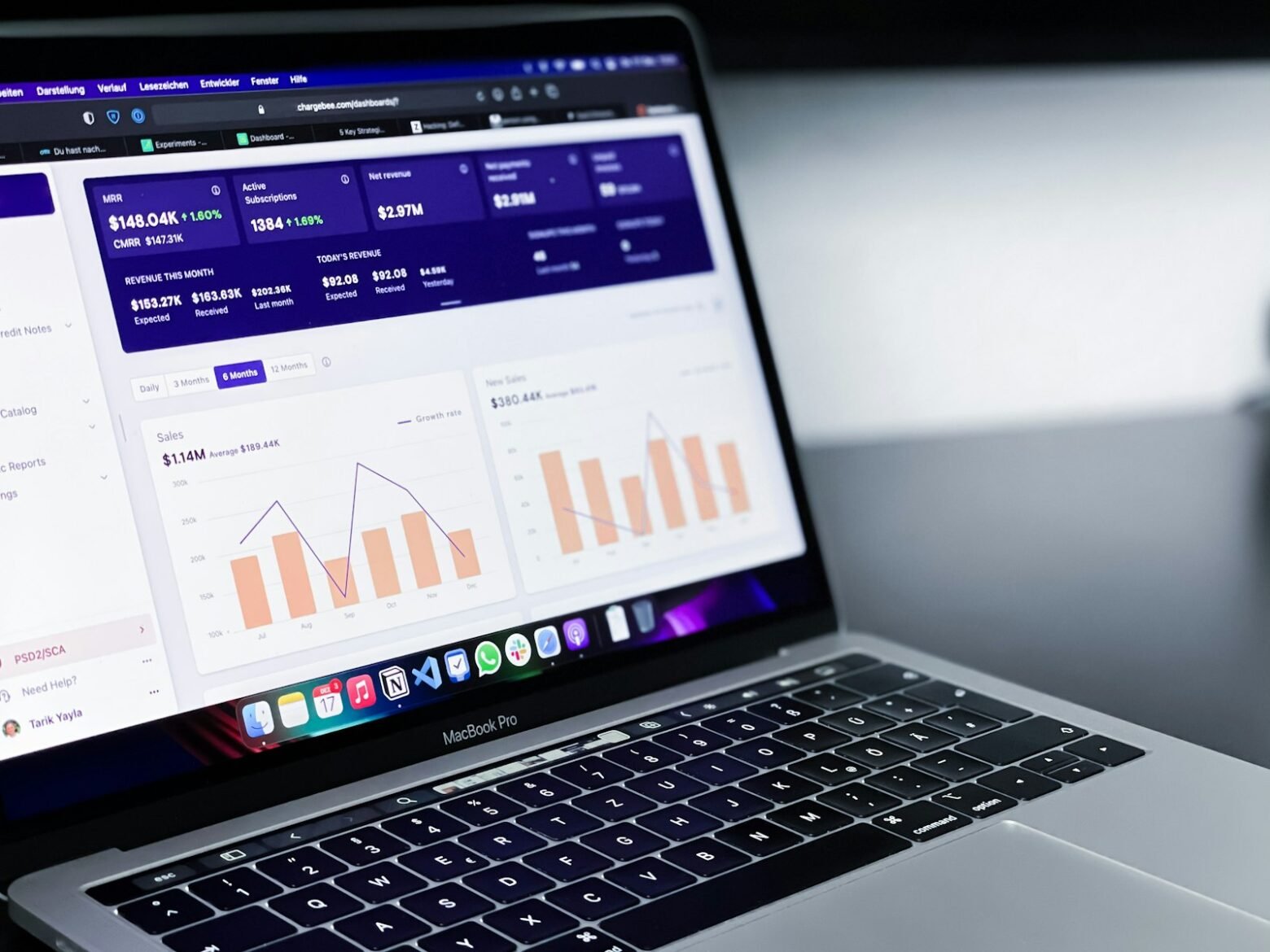 Laptop showing data charts for analytics recruitment