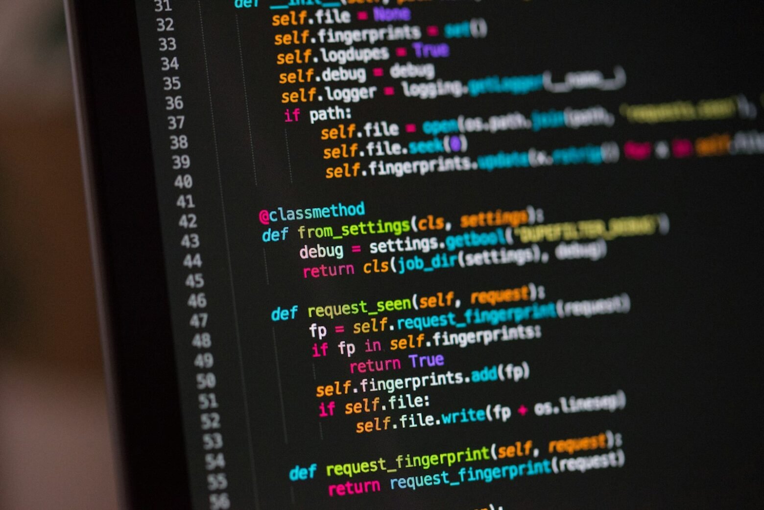Colourful programming code on a developer screen